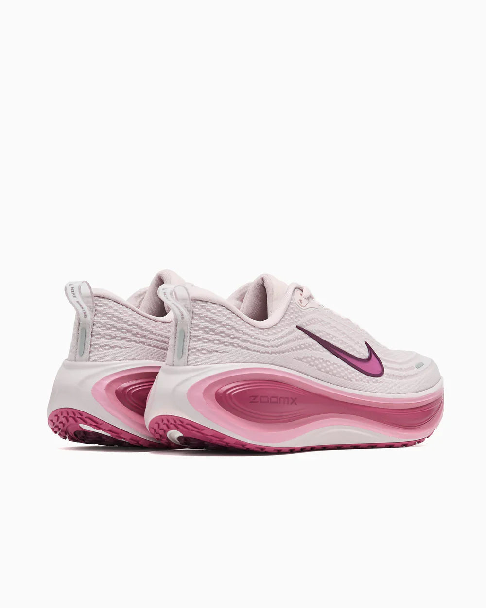 Running Vomero Plus trainers in off white and purple